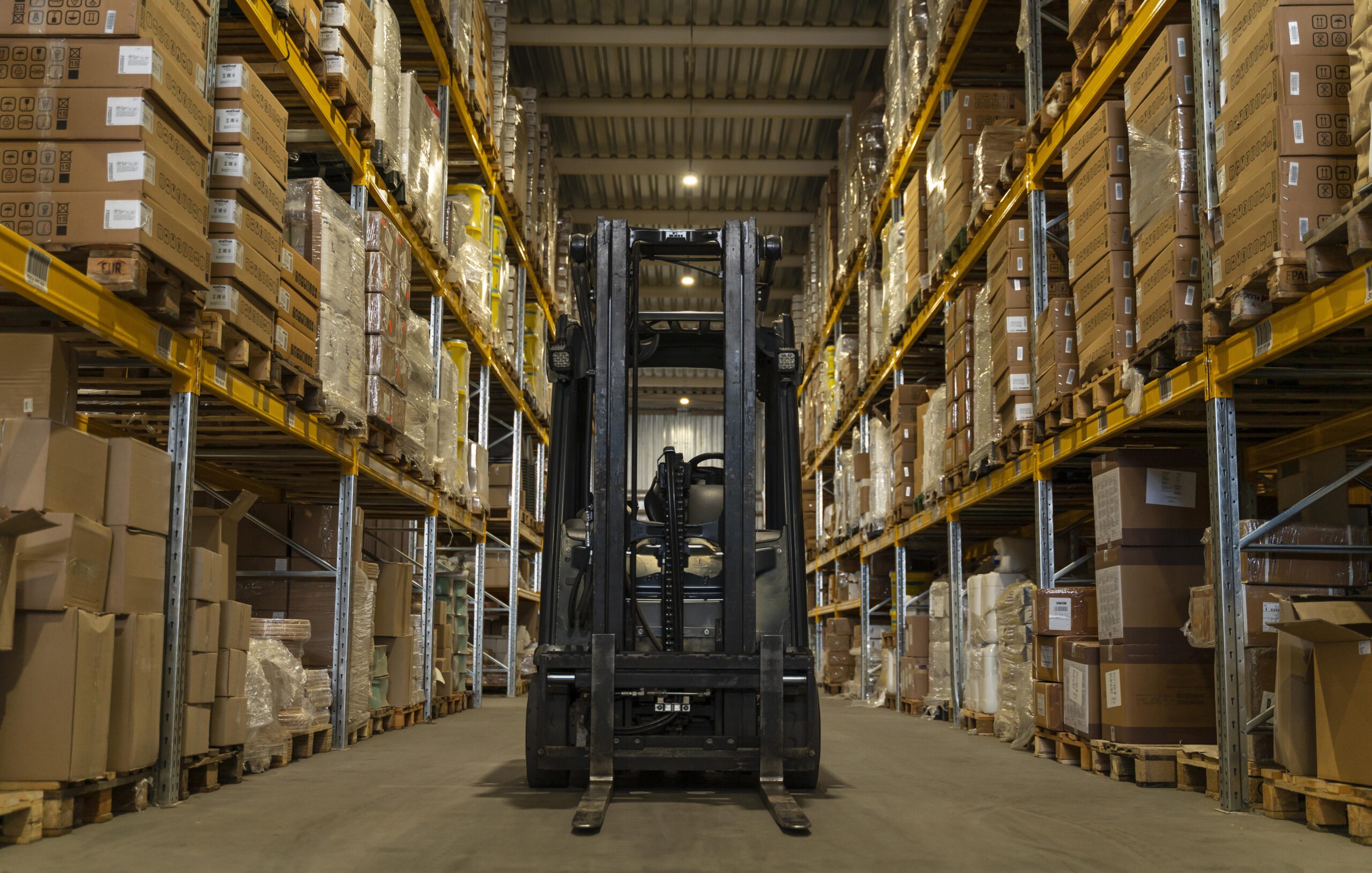 Close up warehouse view with forklift.