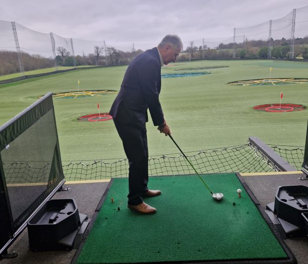 Les Hawkins, Essex Police Specials Co-Ordinator teeing up a shot at Topgolf Chigwell.